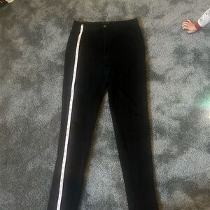 High waisted black skinny pants.